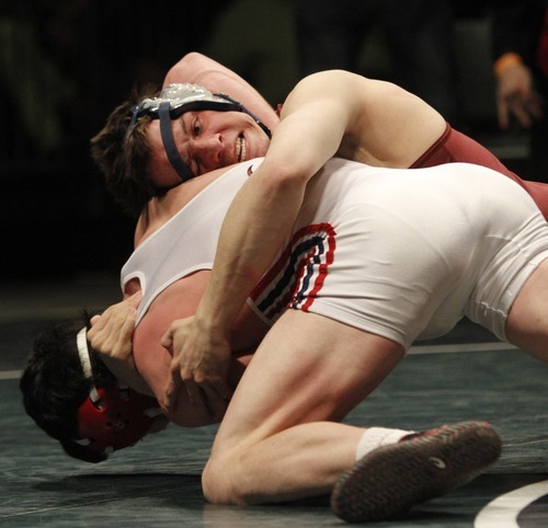 Rick Egan   |  The Salt Lake Tribune

Kyle Foy, Altamont (top) wrestles Maclane Whims, Oakley, for the 1A state wrestling title, in the 171weight class, in Orem, Saturday, February 12, 2011.