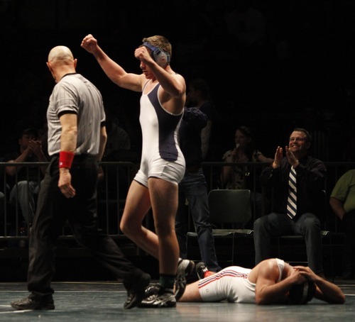 Rick Egan   |  The Salt Lake Tribune

Max Lewis, Duchesne (left) celebrates his win over,Zaquiri Brinkerhoff, Altamont for the 1A state wrestling title, in the 189 weight class, in Orem, Saturday, February 12, 2011.