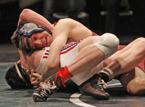 Rick Egan   |  The Salt Lake Tribune

Kyle Foy, Altamont (top) wrestles Maclane Whims, Oakley, for the 1A state wrestling title, in the 171weight class, in Orem, Saturday, February 12, 2011.