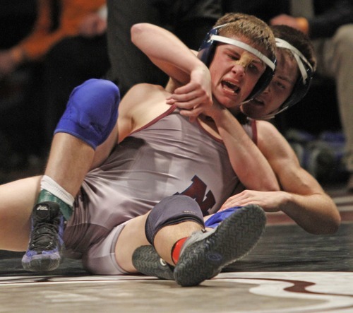 Rick Egan   |  The Salt Lake Tribune

 Courtney Orgill, North Summit, (front) wrestles Kayden Littlefield, (back) Beaver, for the 2A state wrestling title, in the 145 weight class, in Orem, Saturday, February 12, 2011.  Littlefield won the match.