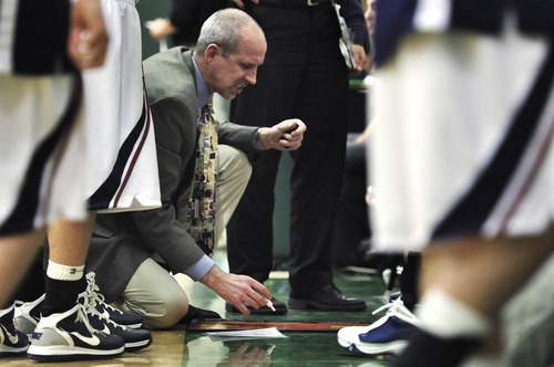 Michael Mangum  |  The Salt Lake Tribune

Waterford head coach Reid Monson calls a play for his team during a timeout in the second half of prep basketball action at Rowland Hall Upper School in Salt Lake City, Utah on Friday, February 11, 2011.