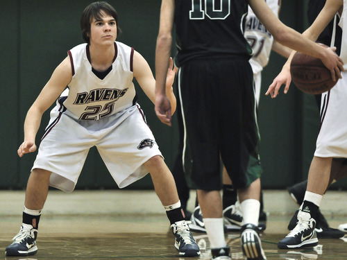 Michael Mangum  |  The Salt Lake Tribune

Waterford forward/center Alex Smidt, 25, defends Rowland Halls Johnny Bebbington, 10, during the first half of prep basketball action at Rowland Hall Upper School in Salt Lake City, Utah on Friday, February 11, 2011.