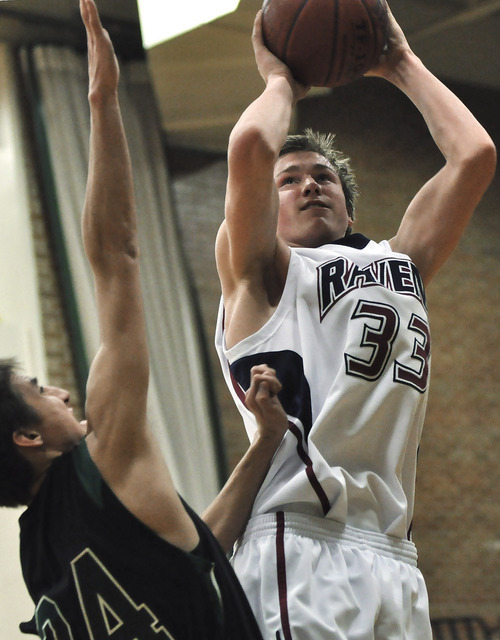 Michael Mangum  |  The Salt Lake Tribune
Waterford forward/center Eric Mika, 33, takes a jumpshot over Rowland Halls Jimmy McCarthy, 24, during the first half of prep basketball action at Rowland Hall Upper School in Salt Lake City.