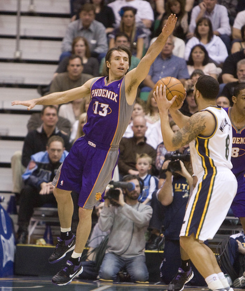 Jeremy Harmon  |  The Salt Lake Tribune

Phoenix Suns guard Steve Nash (13) defends Utah Jazz guard Deron Williams (8) as the Jazz face the Phoenix Suns on Friday, February 11, 2011.