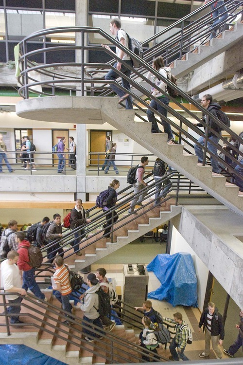 Paul Fraughton  |  The Salt Lake Tribune   

Students crowd the stairway  near the Science Building on the campus of Utah Valley University on Wednesday. Steep tuition increases and unprecedented enrollment caps could be in store for the university, which faces its third straight year of budget cuts in the face of historic enrollment gains.