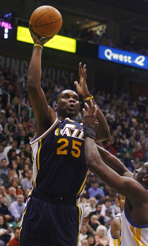 Djamila Grossman  |  The Salt Lake Tribune

Utah Jazz's Al Jefferson (25) shoots at the basket during a game against the Golden State Warriors in Salt Lake City on Wednesday, Feb.16, 2011. The Jazz lost the game.
