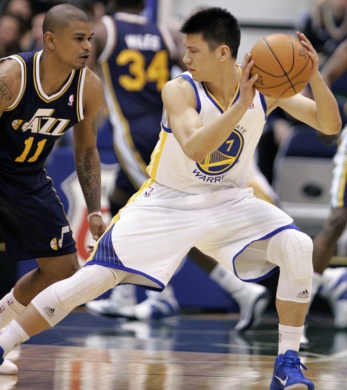 Djamila Grossman  |  The Salt Lake Tribune

The Utah Jazz's Earl Watson (11) guards the Golden State Warriors'  Jeremy Lin (7) during a game in Salt Lake City on Wednesday, Feb.16, 2011. The Jazz lost the game.