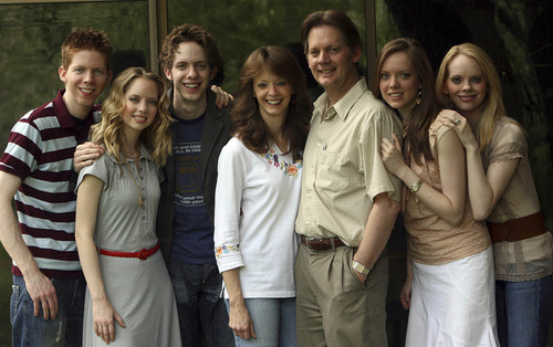 Tribune file photo
The Brown family, shown in 2006, has five 5 kids who have become accomplished pianists as adults and manage their own group, the 5 Browns. Left to right are Ryan, Desirae, Gregory, Lisa (mother), Keith (father), Melody and Deondra. Keith Scott Brown is recovering from a dramatic car crash just days after he was charged with child sexual abuse involving his daughters when they were children.