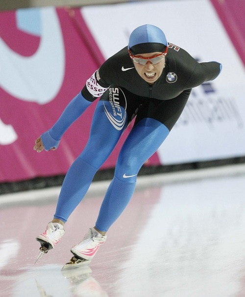 Paul Fraughton  |  The Salt Lake Tribune USA's Jilleanne Rookard  shows the strain as she rounds the corner on the last lap of the ladies 5000 m. THe World Cup Speed Skating Event was held at the Utah Olympic Oval  on   Friday,February 18, 2011
