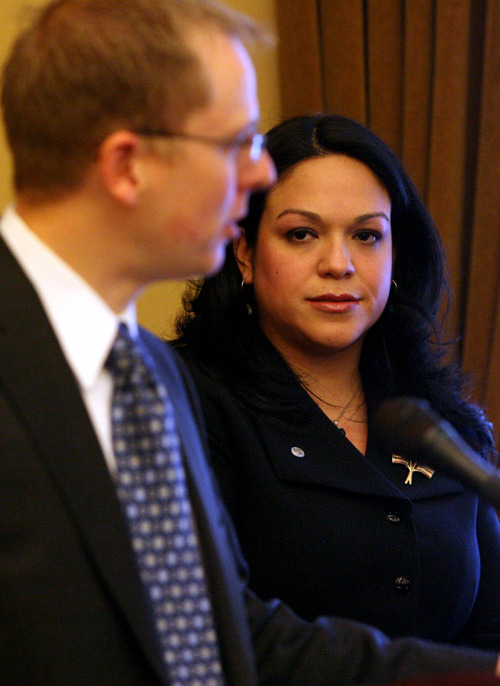 LEAH HOGSTEN  |  The Salt Lake Tribune
Sen. Luz Robles, D-Salt Lake City, has been threatened anonymously during the overheated immigration debate. She is taking precautions and is more attentive of her surroundings. Robles is the sponsor, along with Republican Rep. Jeremy Peterson, R-Ogden, left, of one of the immigration reform bills receiving lots of scrutiny and debate this session.