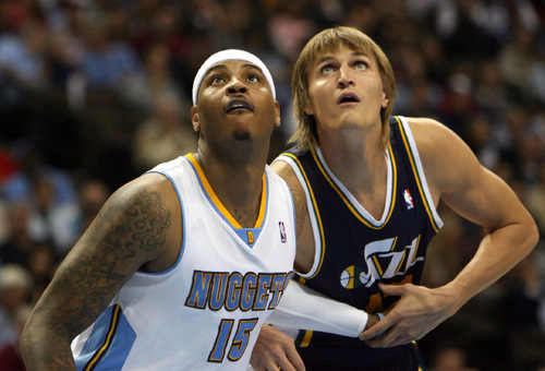 Steve Griffin  |  The Salt Lake Tribune&#xA;&#xA;Denver Nuggets forward Carmelo Anthony boxes out Utah Jazz forward Andrei Kirilenko during first half action of the Jazz season opening game against the Nuggets at the Pepsi Center  in Denver Wednesday, October 27, 2010.