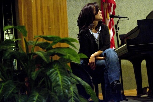 Djamila Grossman  |  The Salt Lake Tribune
Rachelle Call, an LDS songwriter, listens to a singer during 