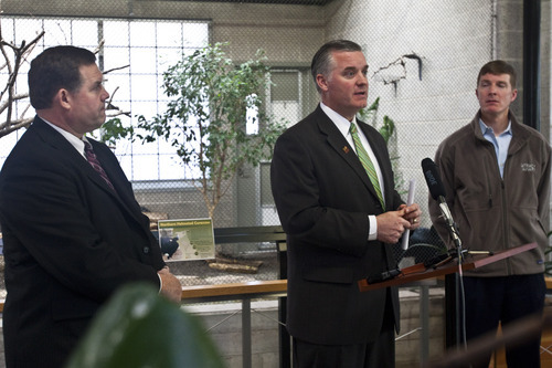 Chris Detrick | The Salt Lake Tribune 
Salt Lake County Mayor Peter Corroon announces during a Wednesday news conference that the county will save thousands of dollars a year on bonds, like the one used to improve Tracy Aviary, because of the county's triple-A bond rating. Wtih him are Jon Bronson, managing director of Zions Bank Public Finance, left, and Tom Barton, chairman of the aviary's board of directors.