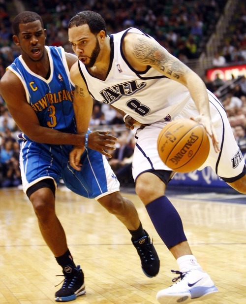 A deal is in the works Wednesday for the Utah Jazz to trade all-star point guard Deron Williams to the New Jersey Nets for two players, two draft picks and cash in a shocking NBA trade. Tribune file photo
