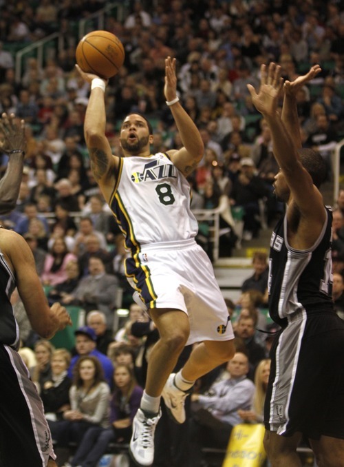 Rick Egan   |  The Salt Lake Tribune

Utah Jazz guard Deron Williams (8) takes the game in to his own hands as he drives up the middle for a shot, in NBA action in Salt Lake City, Wednesday, Jan. 26, 2011. Williams is being traded to the New Jersey Nets.