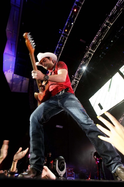 Trent Nelson  |  The Salt Lake Tribune
Country superstar Brad Paisley gets up close to the fans at a past USANA Amphitheatre show in West Valley City.