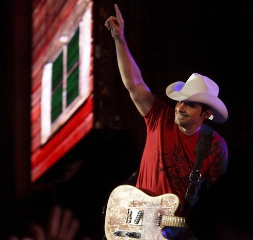 Trent Nelson  |  The Salt Lake Tribune
Country superstar Brad Paisley gestures to the crowd at a past USANA Amphitheatre show in West Valley City. He will headline this year's Stadium of Fire.