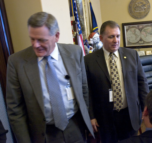 Al Hartmann   |  The Salt Lake Tribune 
Utah Senate Majority Leader Scott Jenkins, left , and Senator Curtis Bramble  leave a press conference in which they unveiled a partial immigration omnibus bill Wednesday, Feb. 23.