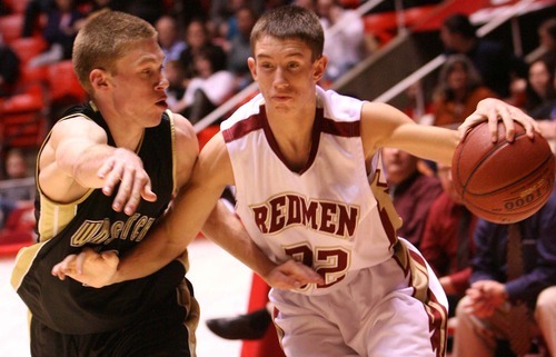 Leah Hogsten  |  The Salt Lake Tribune
Wasatch's Mike Brown pressures Cedar's Kyler Nielson. 
 Wasatch High School defeated  Cedar High School 53-43 during their 3A High School Championship quarterfinals at the Jon M. Huntsman Center on the University of Utah campus on Thursday, Feb. 24, 2011.