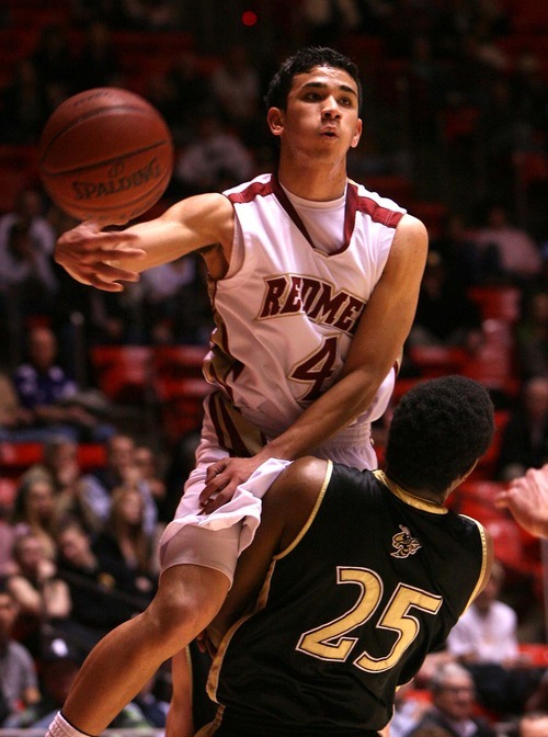 Leah Hogsten  |  The Salt Lake Tribune
Cedar's John Ursua runs over the top of Wasatch's Alex Probst.  
 Wasatch High School defeated  Cedar High School 53-43 during their 3A High School Championship quarterfinals at the Jon M. Huntsman Center on the University of Utah campus on Thursday, Feb. 24, 2011.