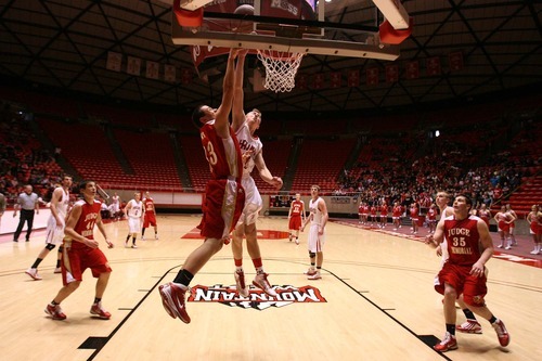 Leah Hogsten  |  The Salt Lake Tribune
Judge's Colin Lawless tops North Sanpete's Colton Dunn. 
Judge High School defeated  North Sanpete High School 53-35  during their 3A High School Championship quarterfinals at the Jon M. Huntsman Center on the University of Utah campus on Thursday, Feb. 24, 2011.