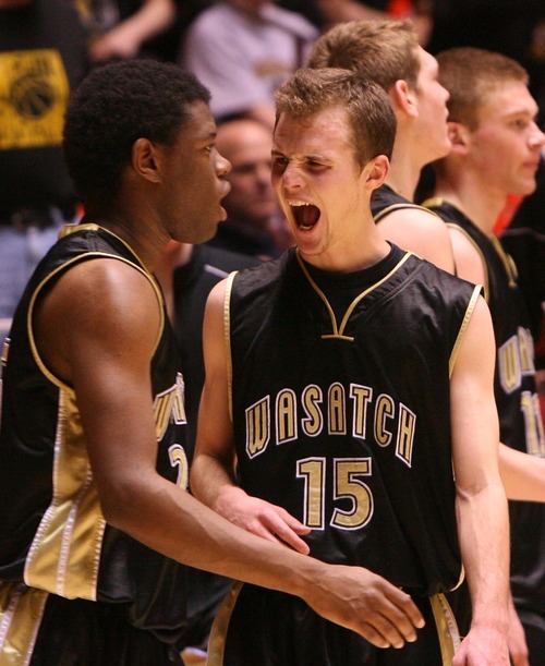 Leah Hogsten  |  The Salt Lake Tribune
Wasatch's Mckay Murdock (left)  celebrates the win with Alex Probst.  Wasatch High School defeated  Cedar Hills High School boys basketball team  53-43 during their 3A High School Championship quarterfinals at the Jon M. Huntsman Center on the University of Utah campus on Thursday, Feb. 24, 2011.