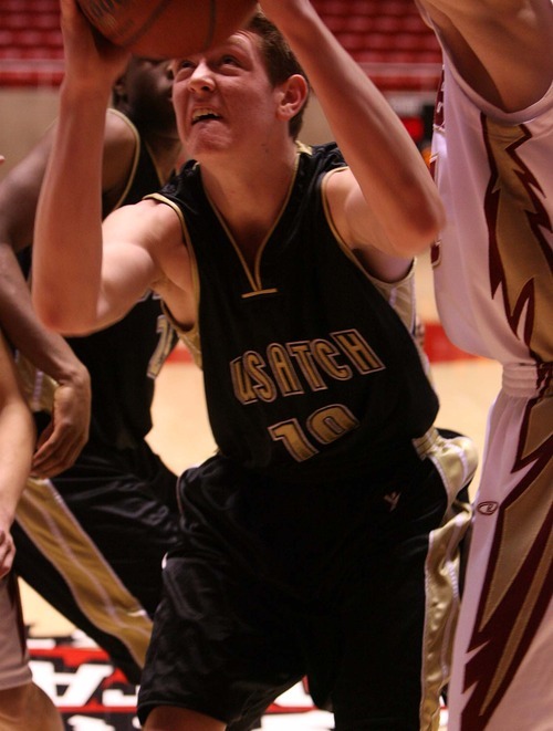 Leah Hogsten  |  The Salt Lake Tribune
Wasatch's Matt Pelo fights under the net.
 Wasatch High School defeated  Cedar High School 53-43 during their 3A High School Championship quarterfinals at the Jon M. Huntsman Center on the University of Utah campus on Thursday, Feb. 24, 2011.