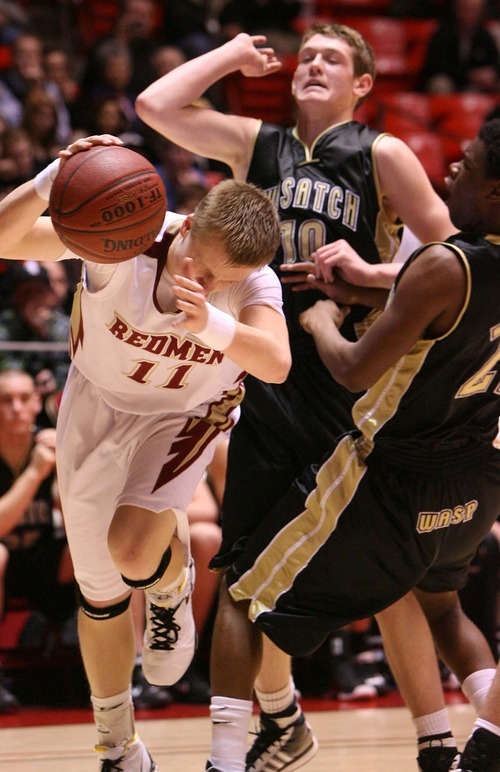 Leah Hogsten  |  The Salt Lake Tribune
Cedar's Eric Nakken is fouled by Wasatch's Alex Probst, right. Center is Wasatch's  Matt Pelo. 
 Wasatch High School defeated  Cedar High School 53-43 during their 3A High School Championship quarterfinals at the Jon M. Huntsman Center on the University of Utah campus on Thursday, Feb. 24, 2011.