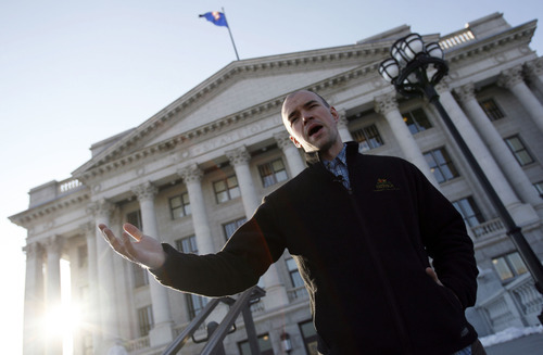 In this 2009 Tribune file photo, Tim DeChristopher, a University of Utah student who monkey-wrenched a lease auction, speaks on the steps of the Utah capitol.