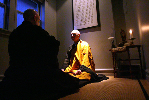 In this 2005 Tribune file photo, Genpo Roshi Dennis Merzel, Zen Master, interviews Michael Zimmerman to test his conceptual mind and transcendental understanding to help him go beyond the dualistic mind.
