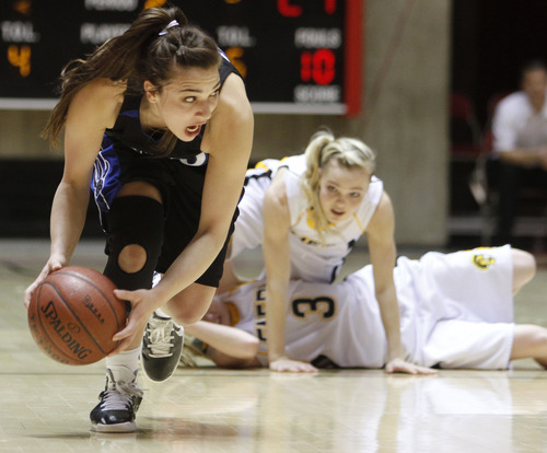 Rick Egan   |  The Salt Lake Tribune

Tayler Jewkes (3) Emery, crahses into a team mate, after  ball was knocked away by Tia Pappas (20) Carbon High, in the 3A girls state championship game, Carbon vs. Emery, at Huntsman Center, Saturday, February 26, 2011