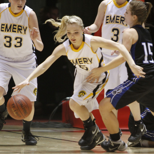 Rick Egan   |  The Salt Lake Tribune

Blayr Jeffs (5) Emery, dribbles down court, as Mariah Pollock (15) Carbon High, goes for the ball,  in 3A girls state championship game, Carbon vs. Emery, at Huntsman Center, Saturday, February 26, 2011