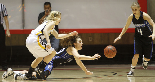 Rick Egan   |  The Salt Lake Tribune

Blayr Jeffs (5) Emery,  goes after the ball, as Tia Pappas (20) Carbon  passes off to  Kristen Jewkes (4) Carbon,  in 3A girls state championship game, Carbon vs. Emery, at Huntsman Center, Saturday, February 26, 2011