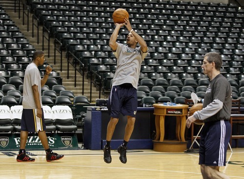 Utah Jazz guard Devin Harris, center, shoots before the game against Indiana Pacers, Thursday, Feb. 25, 2011, at the Conseco Fieldhouse in Indianapolis. (Photo special to The Tribune | Kamil Krzaczynski)