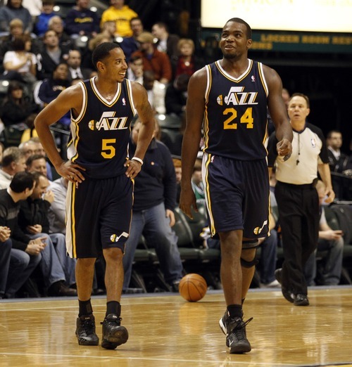 Utah Jazz guard Devin Harris, left, and Utah Jazz forward Paul Millsap, right, smile during final moments of their game against Indiana Pacers, Thursday, Feb. 25, 2011, at the Conseco Fieldhouse in Indianapolis, Indiana. (Photo special to the Tribune / Kamil Krzaczynski)