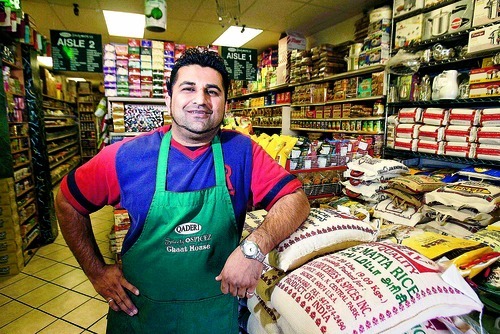 Paul Fraughton  |  The Salt Lake Tribune  Yousuf Khanani in his store Sweetz n' Spicez, which sells Pakistani and Indian groceries and spices in West Valley City.