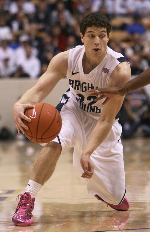 Steve Griffin  |  The Salt Lake Tribune
 
BYU's Jimmer Fredette crosses over his dribble during first half action in the BYU versus CSU men's basketball game at the Marriott Center in Provo, Utah Wednesday, February 23, 2011.