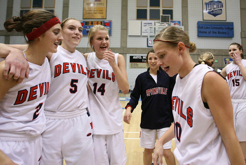 Leah Hogsten  |  The Salt Lake Tribune
Springville celebrates the win.
Springville High School girls defeated Mountain Crest High School 44-40 for the 4A 2011 High School Championship title at Salt Lake Community College Saturday February 26, 2011