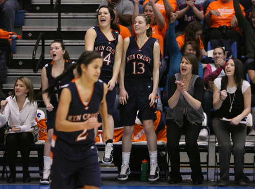 Leah Hogsten  |  The Salt Lake Tribune
Mountain Crest's  bench erupts after the team took the lead for the first time in the remaining three minutes of the game. 
Springville High School girls defeated Mountain Crest High School 44-40 for the 4A 2011 High School Championship title at Salt Lake Community College Saturday February 26, 2011