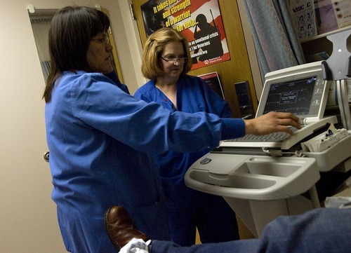 Djamila Grossman  |  The Salt Lake Tribune
Nurses Gwen James, left, and Nancy Dice, print out an EKG reading at the womens clinic at the VA Medical Center in Salt Lake City, Utah, on Thursday, February 24, 2011.