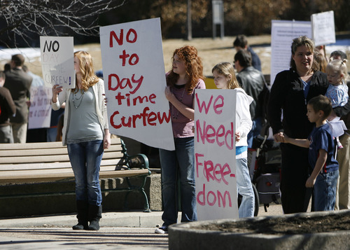 Francisco Kjolseth  |  The Salt Lake Tribune
Home-schoolers gather Tuesday outside the Provo City Center to protest a proposal to crack down on truants. Mayor John R. Curtis asked the Municipal Council to withdraw the ordinance.