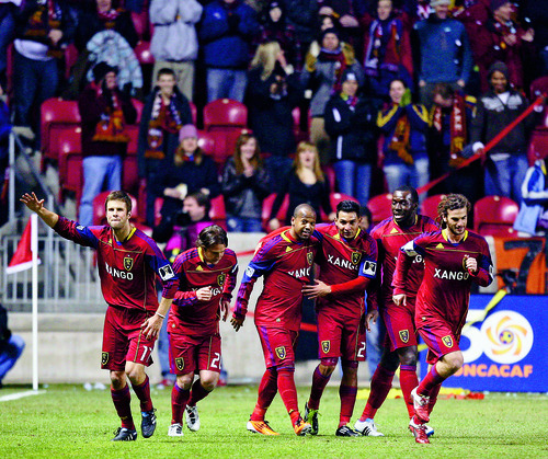 Steve Griffin  |  The Salt Lake Tribune
 
Andy Williams, center, is congratulated by his Real Salt Lake teammates after scoring a goal during second-half action in the CONCACAF Champions League quarterfinal game between Real Salt Lake and Columbus at Rio Tinto Stadium in Sandy on Tuesday, March 1, 2011.
