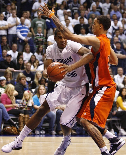 Djamila Grossman  |  The Salt Lake Tribune

BYU's Brandon Davies is guarded by UTEP's John Bohannon as Brigham Young University plays the University of Texas at El Paso in Provo, Thursday, Dec. 23, 2010. BYU won the game.