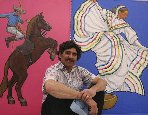 Leah Hogsten  |  The Salt Lake Tribune
 Artist and art instructor Jimmy Lucero in front of his work Wednesday, March 2, 2011. Latino artists have painted a series of murals in the new Viva Market.