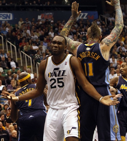 Photo by Chris Detrick | The Salt Lake Tribune 
Utah Jazz center Al Jefferson (25) argues a call during the first half of the game at EnergySolutions Arena Thursday March 3, 2011.