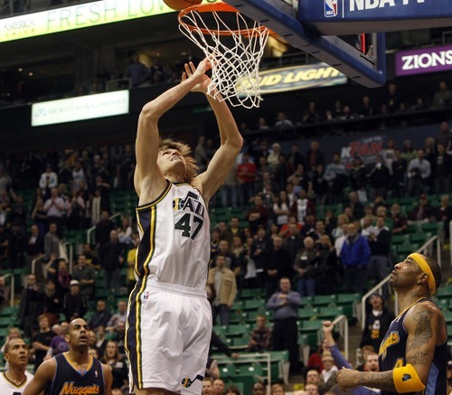 Photo by Chris Detrick | The Salt Lake Tribune 
Utah Jazz small forward Andrei Kirilenko (47) goes up for a last second shot during the second half of the game at EnergySolutions Arena Thursday March 3, 2011.  Denver won the game 103-101.