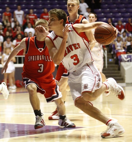 Rick Egan   |  The Salt Lake Tribune

Bountiful's Mckay Lasalle dribbles past Springville's Parker Brady in 4A Championship basketball action at the Dee Event Center in Ogden, Thursday, March 3, 2011.