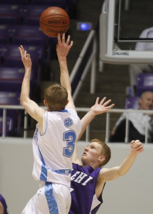 Rick Egan   |  The Salt Lake Tribune
 
Ty Nielsen (3) Sky View, shoots over Blake Cleveringa (4), Lehi, in 4A Championship basketball action,
 Lehi vs. Sky View,  at the Dee Event Center in Ogden, Thursday, March 3, 2011