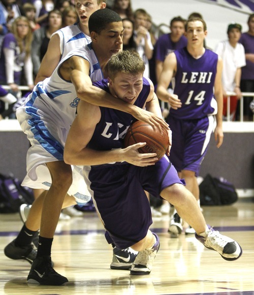 Rick Egan   |  The Salt Lake Tribune

Dustin Draeger	(25),
 Lehi, is fouled by Riley Knowles (10), Sky View in 4A Championship basketball action,
 Lehi vs. Sky View,  at the Dee Event Center in Ogden, Thursday, March 3, 2011