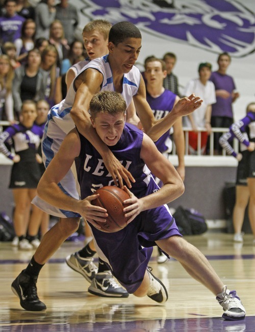 Rick Egan   |  The Salt Lake Tribune

Dustin Draeger	(25),
 Lehi, is fouled by Riley Knowles (10), Sky View in 4A Championship basketball action,
 Lehi vs. Sky View,  at the Dee Event Center in Ogden, Thursday, March 3, 2011